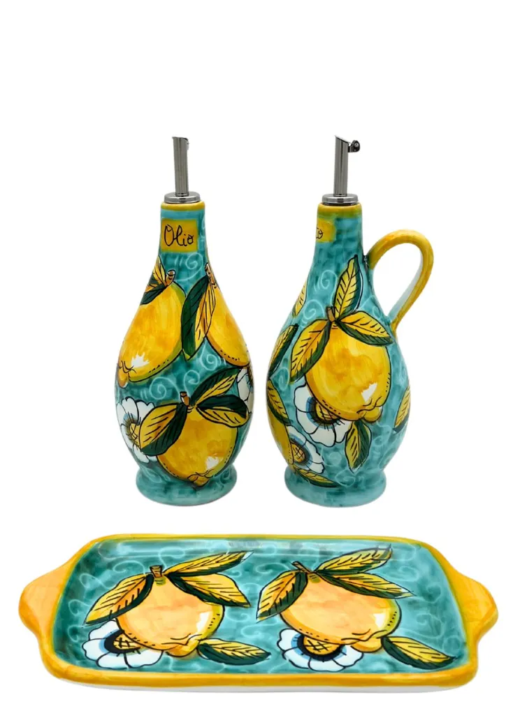 set olio e aceto con vassoio limone con ricciolo verde.webp